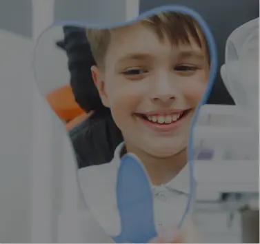 Boy smiling at the dental office